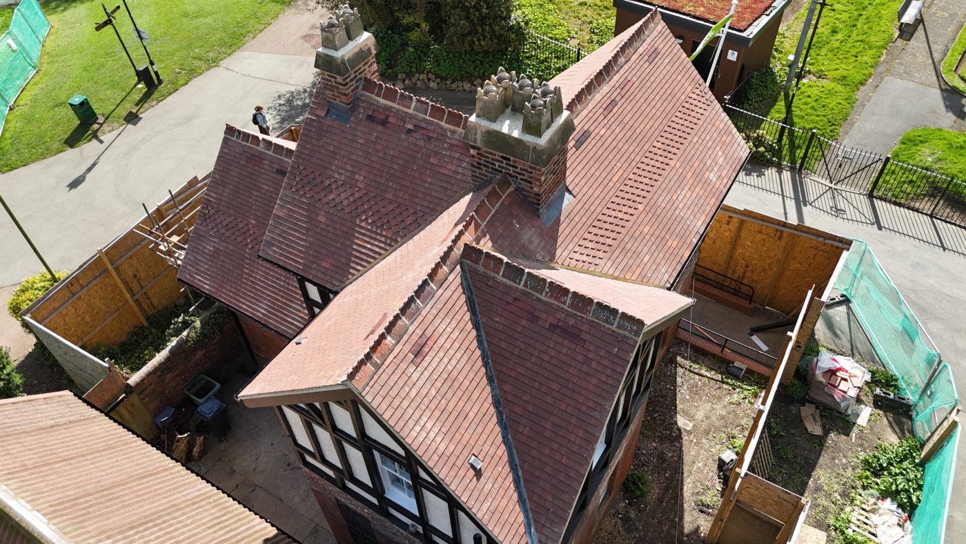 Heritage roof replacement at Roker Park Sunderland using Marley Acme plain tiles with lead valleys and bat conservation system