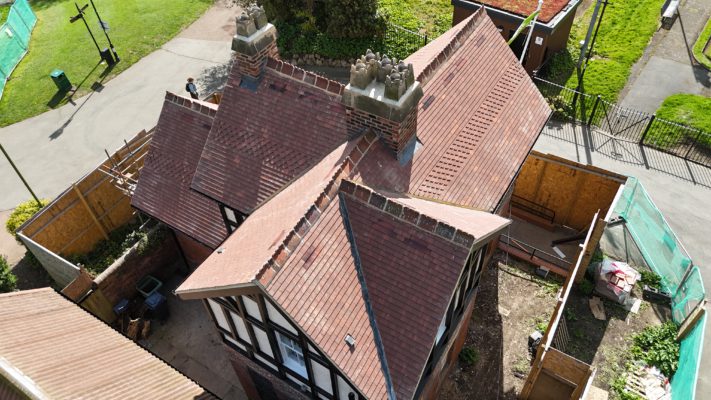 Heritage roof replacement at Roker Park Sunderland using Marley Acme plain tiles with lead valleys and bat conservation system